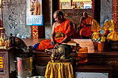 Chiang Mai - Wat Phra That Doi Suthep. Buddhist monks inside the Northern vihan. 